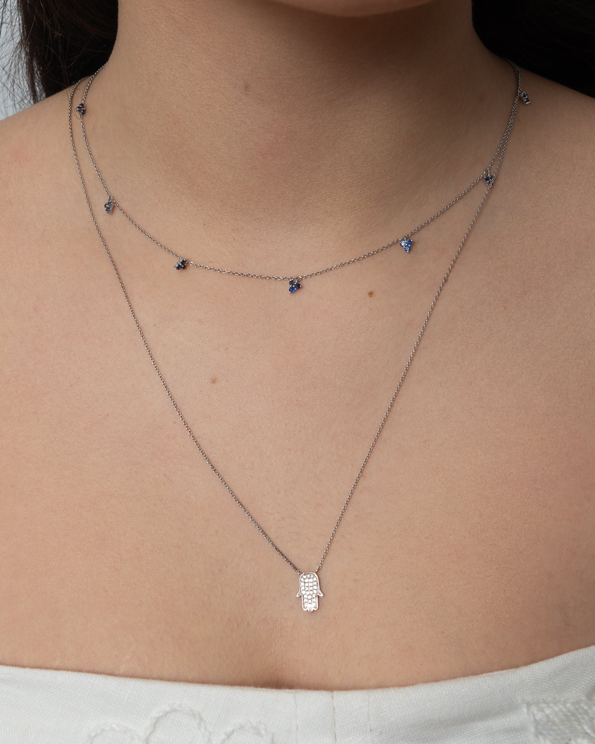 Colar ouro 18k com 7 triângulos de safira
