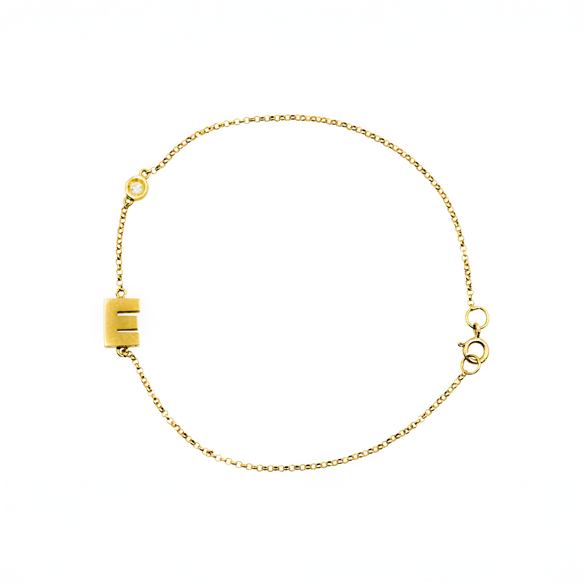 Pulseira letra E ouro 18k e diamante