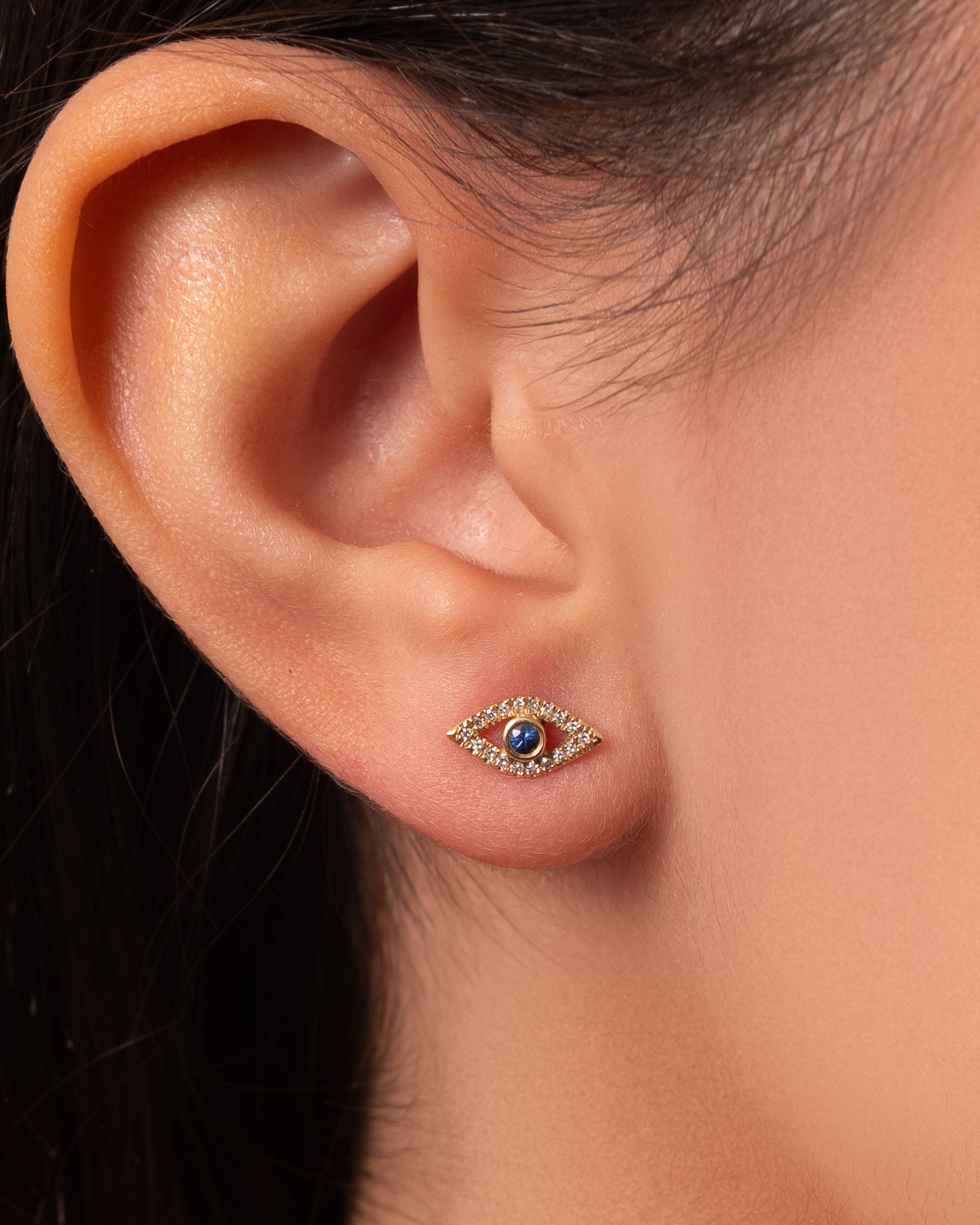 Brinco olho grego ouro 14k com diamante e safira