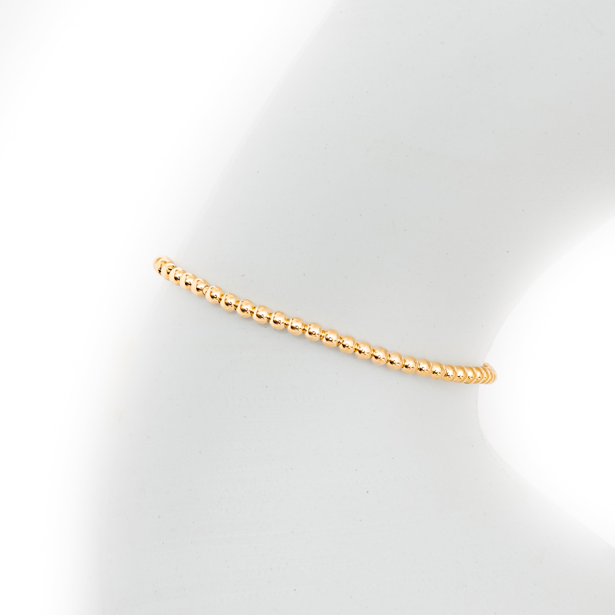 Pulseira maleável bolinhas ouro 18k